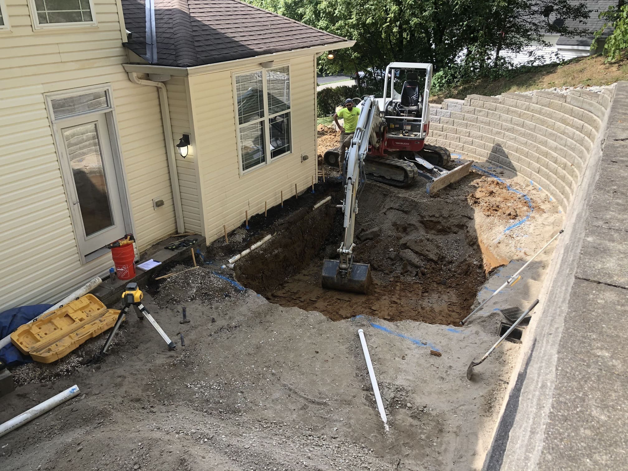 inground-pool-excavation-mini-excavator-retaining-wall-compressed Pool Construction